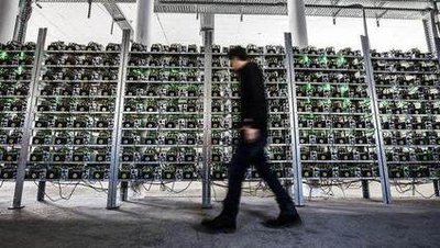 A sprawling mining farm facility showcasing rows of miners dedicated to Bitcoin and Ethereum extraction
